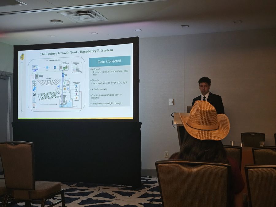 Gerardo Gutierrez presenting the Raspberry Pi lettuce growth tent system